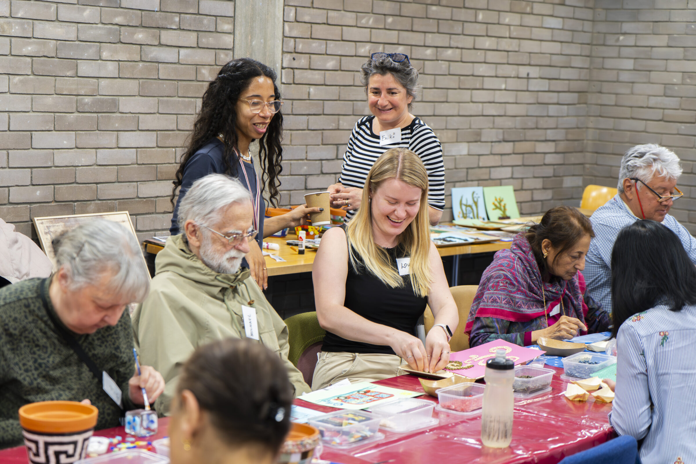 Participants and artist enjoying a creative session