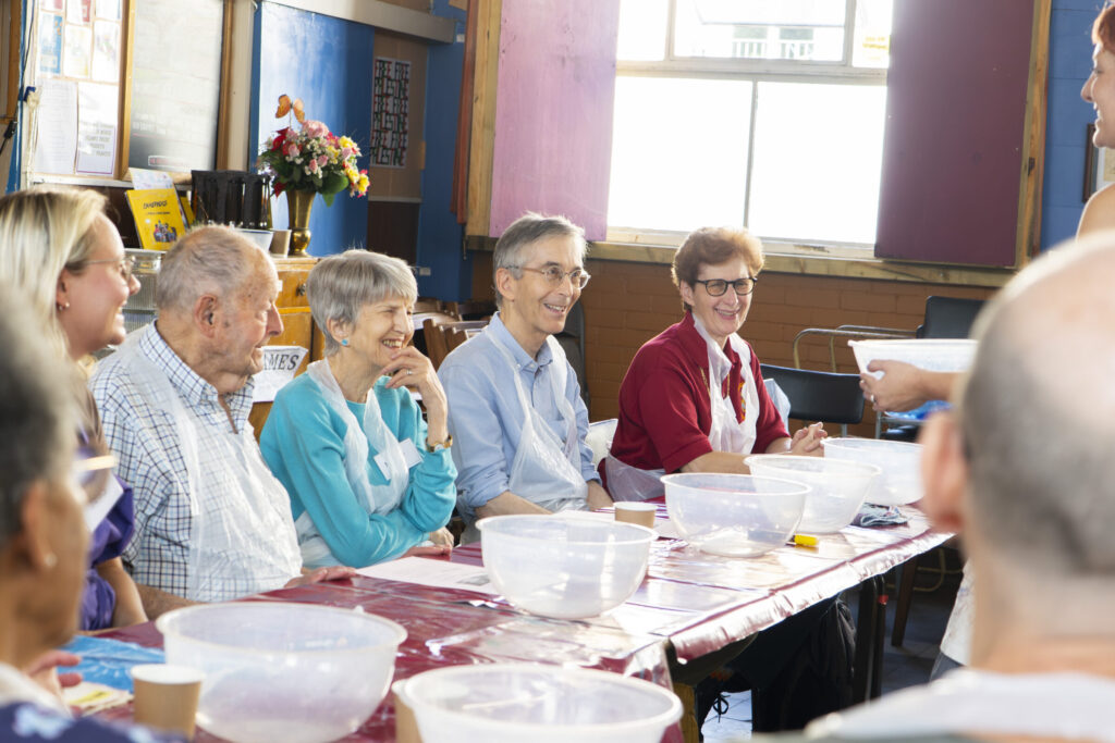 Brett and Roy sharing a moment of laughter during a workshop