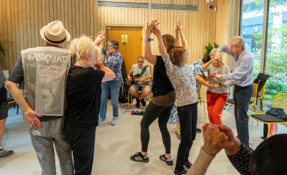 Group enjoying dancing scenes from Sleeping Beauty