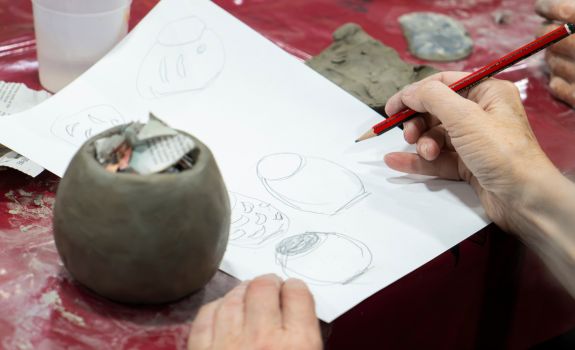 Participant pencil drawing of clay pots