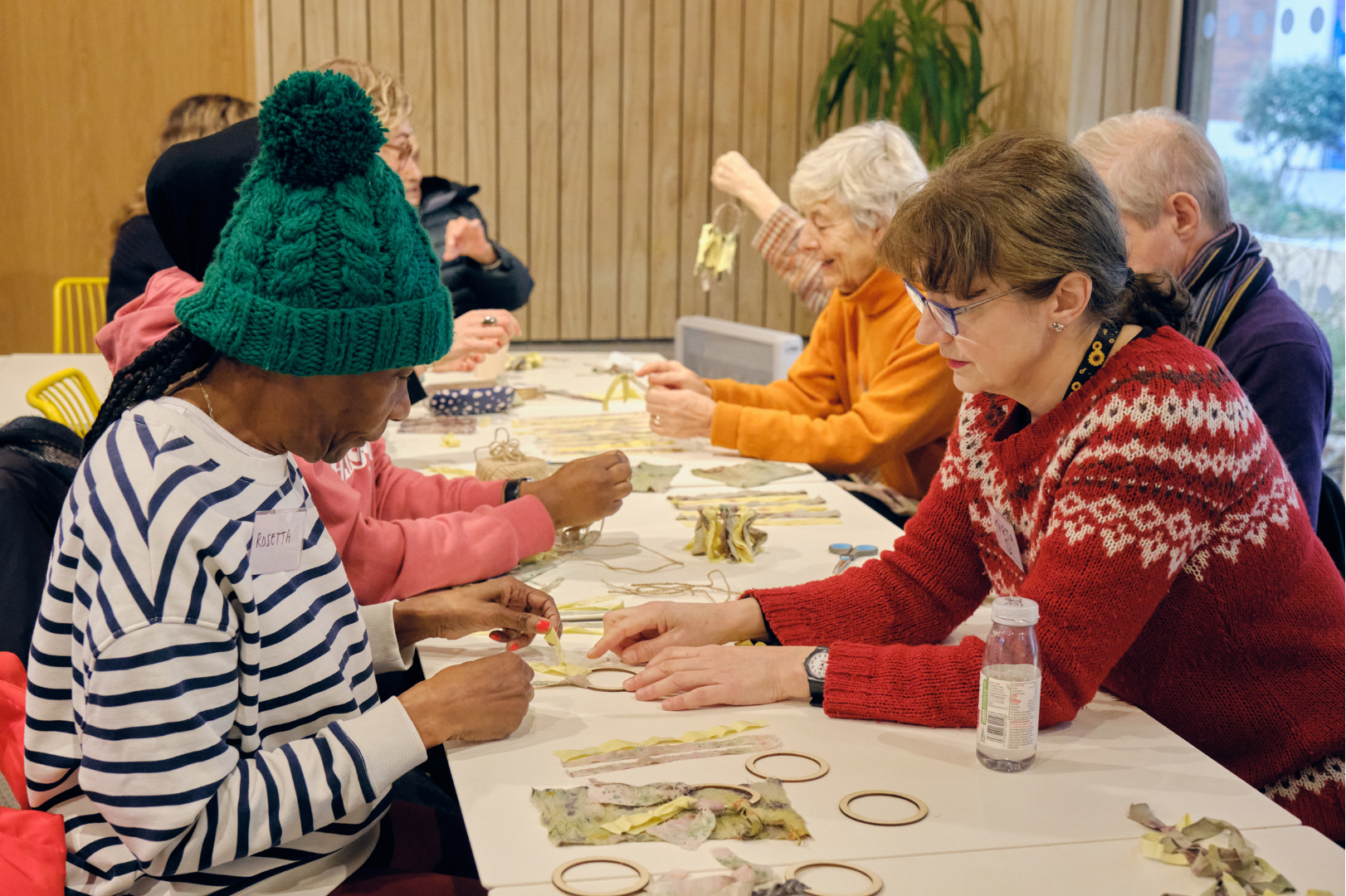 A group of people taking part in an art class.